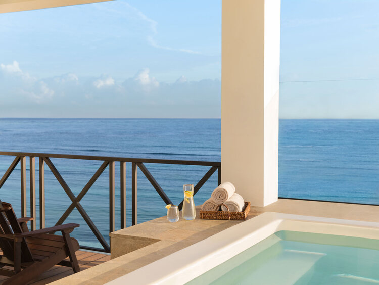 Excellence Oyster Bay Jamaica, luxury all-inclusive resort, adults-only Jamaica getaway, 40th birthday group trip, milestone birthday celebration, private beach villas Jamaica, Montego Bay luxury resort, spa retreat in Jamaica, beachfront suites, gourmet dining Jamaica, Caribbean group travel, exclusive resort experiences, personalized celebration packages, Excellence Club benefits, rooftop terrace suites, Jamaica all-inclusive birthday trip.