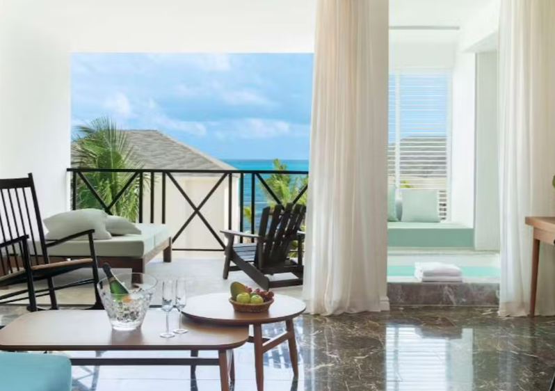 Excellence Oyster Bay Jamaica, luxury all-inclusive resort, adults-only Jamaica getaway, 40th birthday group trip, milestone birthday celebration, private beach villas Jamaica, Montego Bay luxury resort, spa retreat in Jamaica, beachfront suites, gourmet dining Jamaica, Caribbean group travel, exclusive resort experiences, personalized celebration packages, Excellence Club benefits, rooftop terrace suites, Jamaica all-inclusive birthday trip.