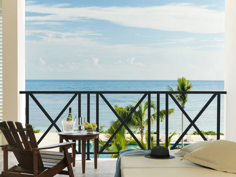 Excellence Oyster Bay Jamaica, luxury all-inclusive resort, adults-only Jamaica getaway, 40th birthday group trip, milestone birthday celebration, private beach villas Jamaica, Montego Bay luxury resort, spa retreat in Jamaica, beachfront suites, gourmet dining Jamaica, Caribbean group travel, exclusive resort experiences, personalized celebration packages, Excellence Club benefits, rooftop terrace suites, Jamaica all-inclusive birthday trip.
