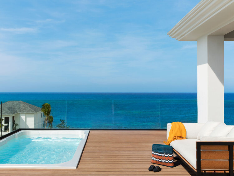 Excellence Oyster Bay Jamaica, luxury all-inclusive resort, adults-only Jamaica getaway, 40th birthday group trip, milestone birthday celebration, private beach villas Jamaica, Montego Bay luxury resort, spa retreat in Jamaica, beachfront suites, gourmet dining Jamaica, Caribbean group travel, exclusive resort experiences, personalized celebration packages, Excellence Club benefits, rooftop terrace suites, Jamaica all-inclusive birthday trip.